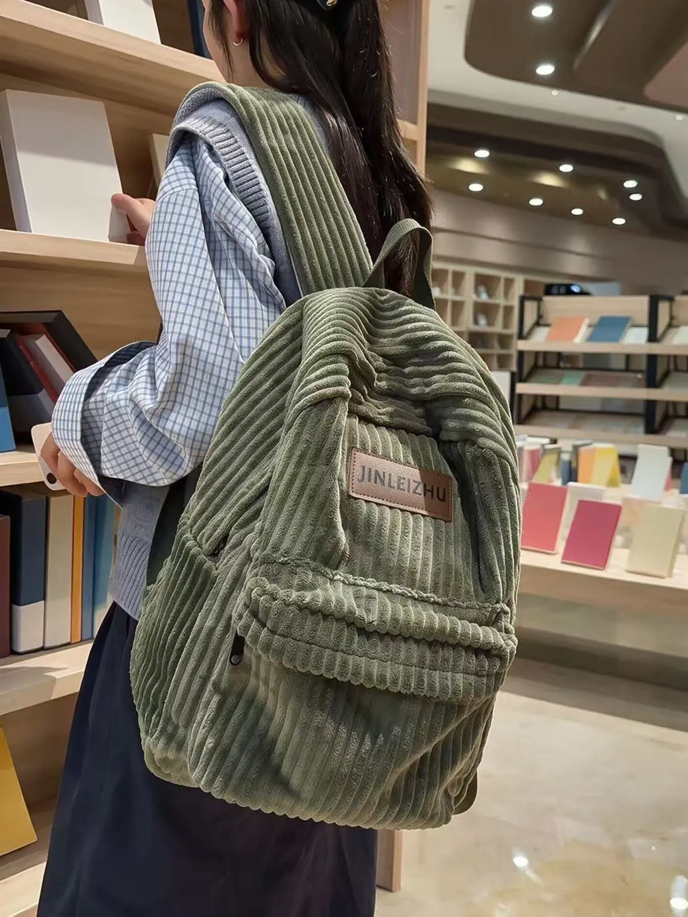 Back-to-school season with soft vertical stripes and a backpack, Lightweight casual daypack, multiple compartments with front zipper pocket, large capacity, simple solid color design, lightweight and versatile for daily commuting and outings