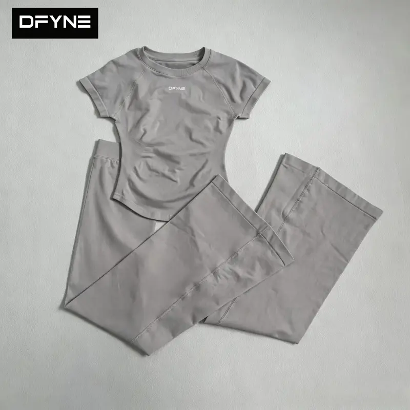 DFYNE Women's Seamless 2 Piece Workout Set Short Sleeve Top and Flare Leggings with Pockets
