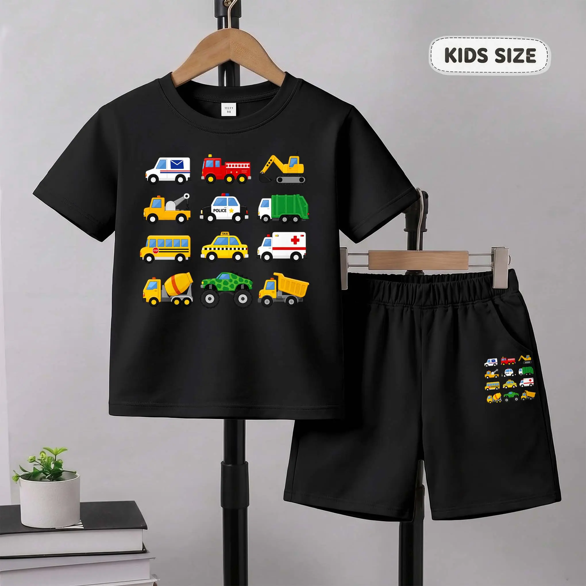 Kids’ Police Cars, Garbage Trucks, And Ambulances Cartoon Print Short-Sleeve T-Shirt And Shorts Set—Casual Summer Kids' Clothing. This Round-Neck Outfit Combination Is Perfect For Everyday Wear And Outdoor Play.