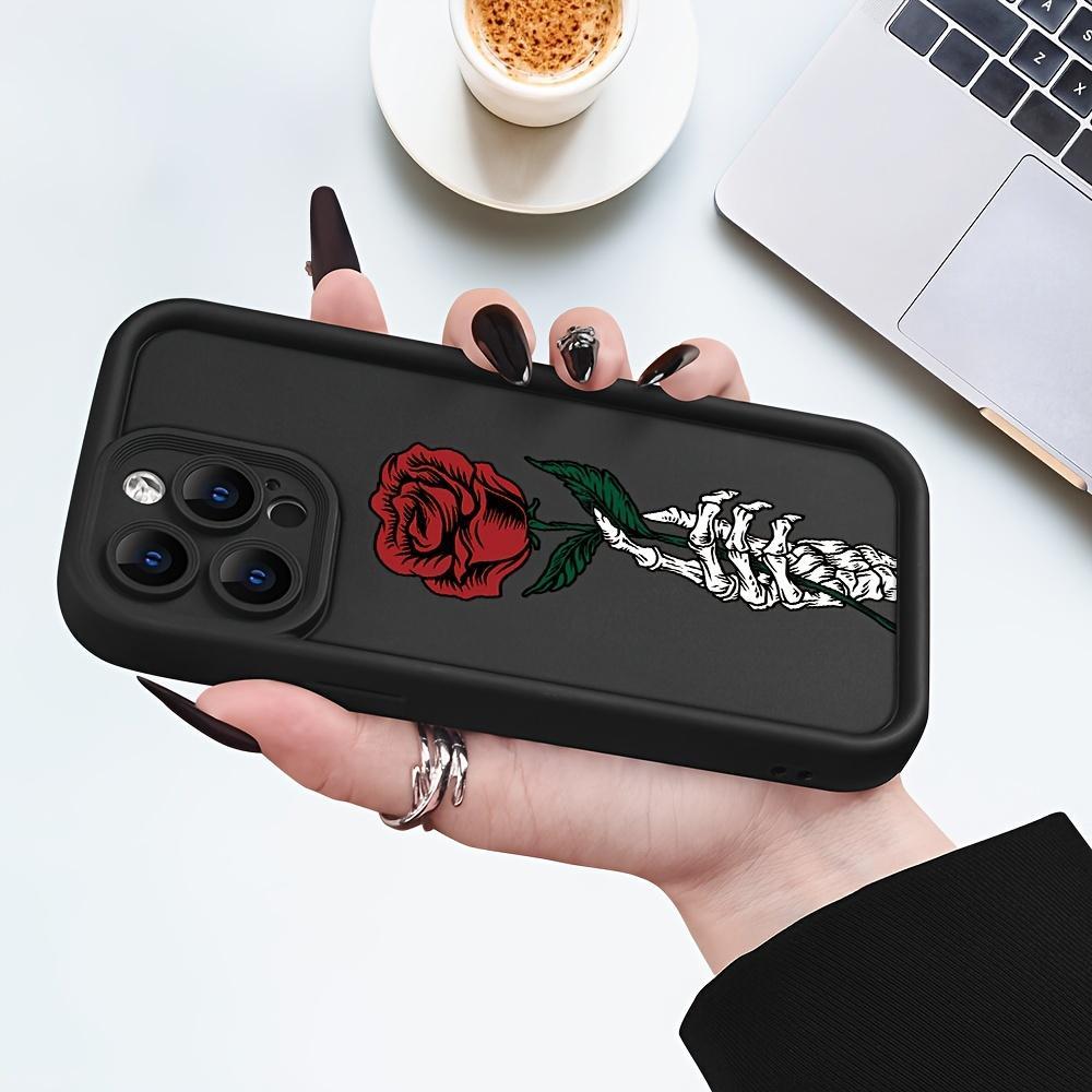 Black Phone Cover Designed for Iphone Models 16 Pro Max, 15 Plus, 14, 13, 12, 11, XR, And XS Featuring a Skull And Rose Design, Made from Anti-Scratch And Shockproof TPU Material for Drop Protection.