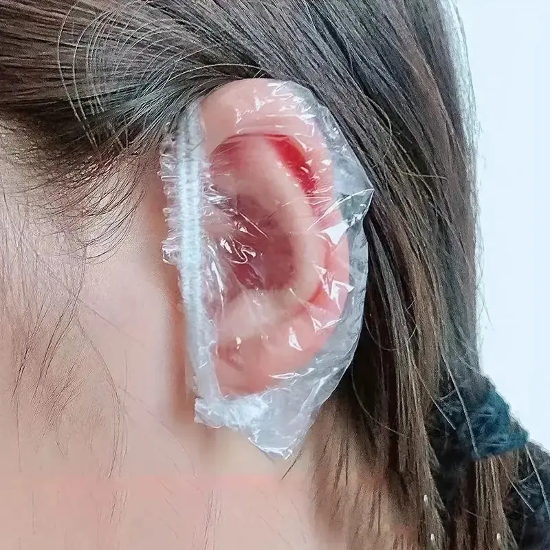 A set of 100 waterproof ear cover kits, Bulk Pack, featuring transparent elastic protective covers with zipper closure design. Suitable for use in situations such as dyeing, bathing, spa treatments, hairdresser accessories, and more.