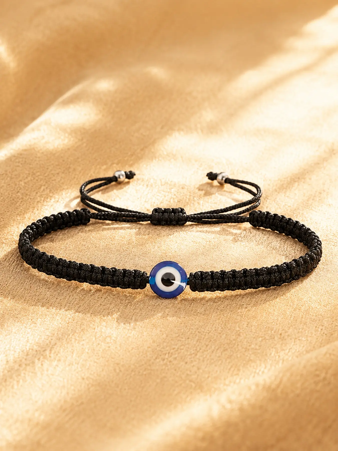 Adjustable braided rope evil eye bracelet, simple bohemian style friendship bracelet, fashionable handmade jewelry, suitable for both men and women.