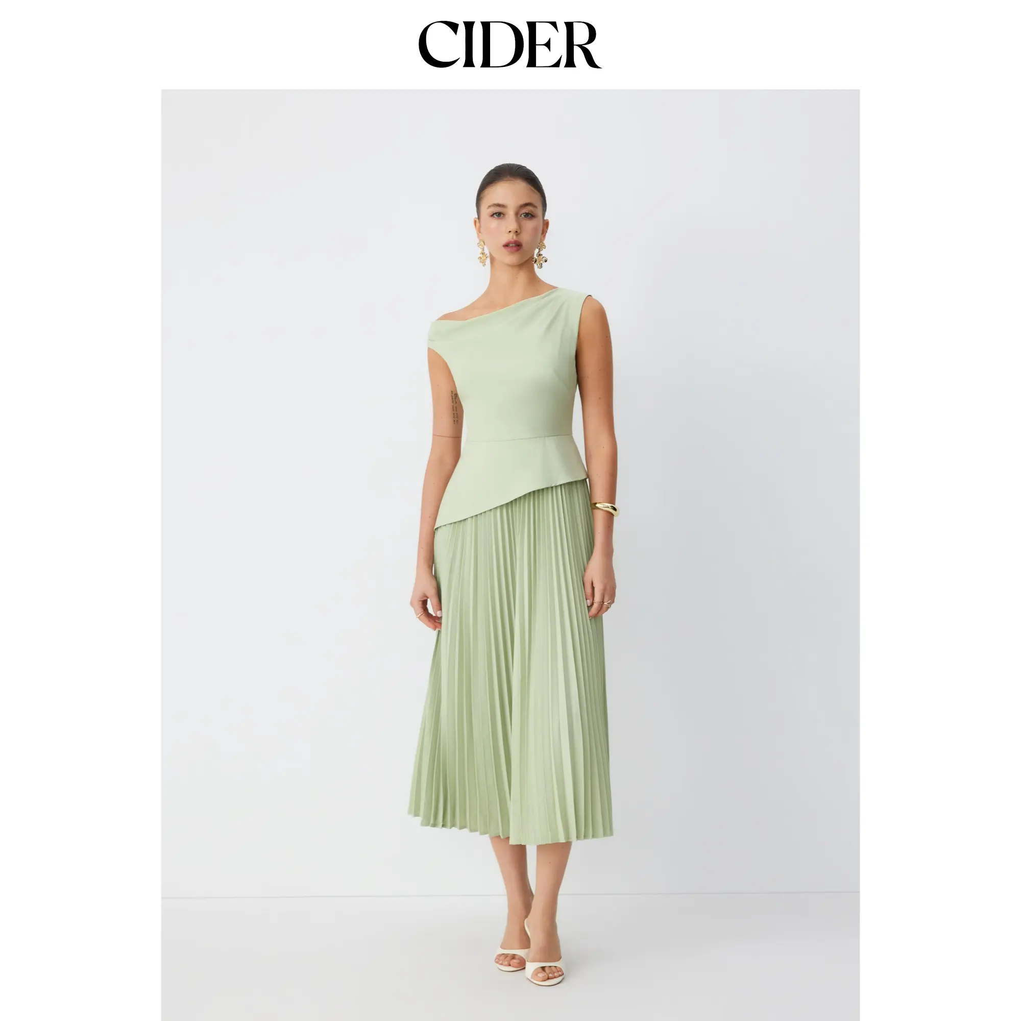 Cider Asymmetrical Neck Pleated Flared Maxi Dress SohoChic
