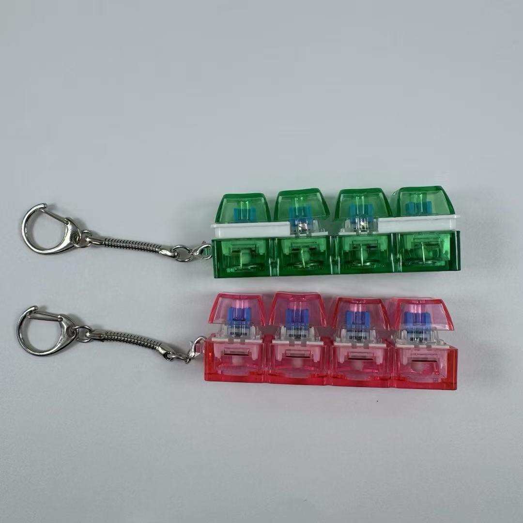 4-key decompression button, Russian Tetris keychain, mechanical key with light-emitting function, stress-reducing fingertip toy key.