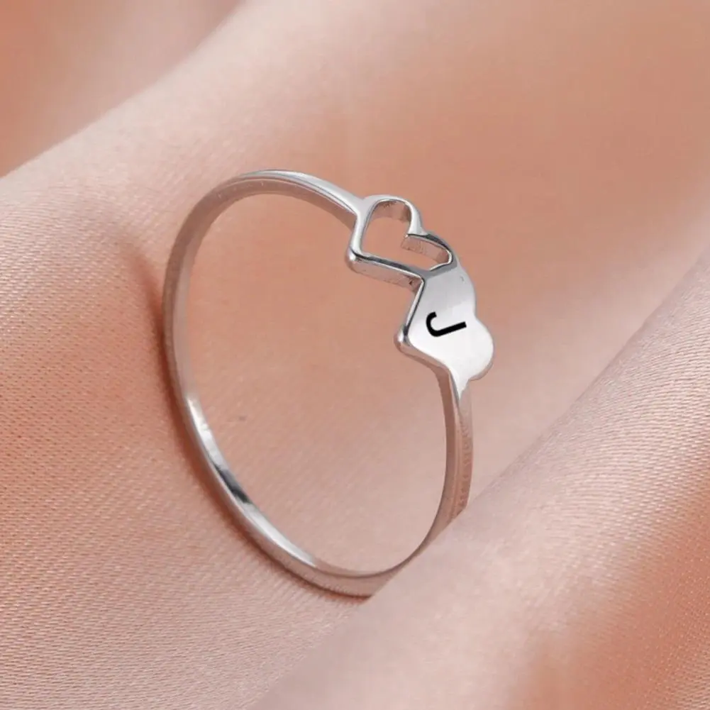 Crafted with hollow heart‑shaped design, this adjustable open ring features all 26 alphabet letters. Minimalist silver finish, great for stacking, nice daily accessory & thoughtful gift for women and girls.engagement rings,promise rings.