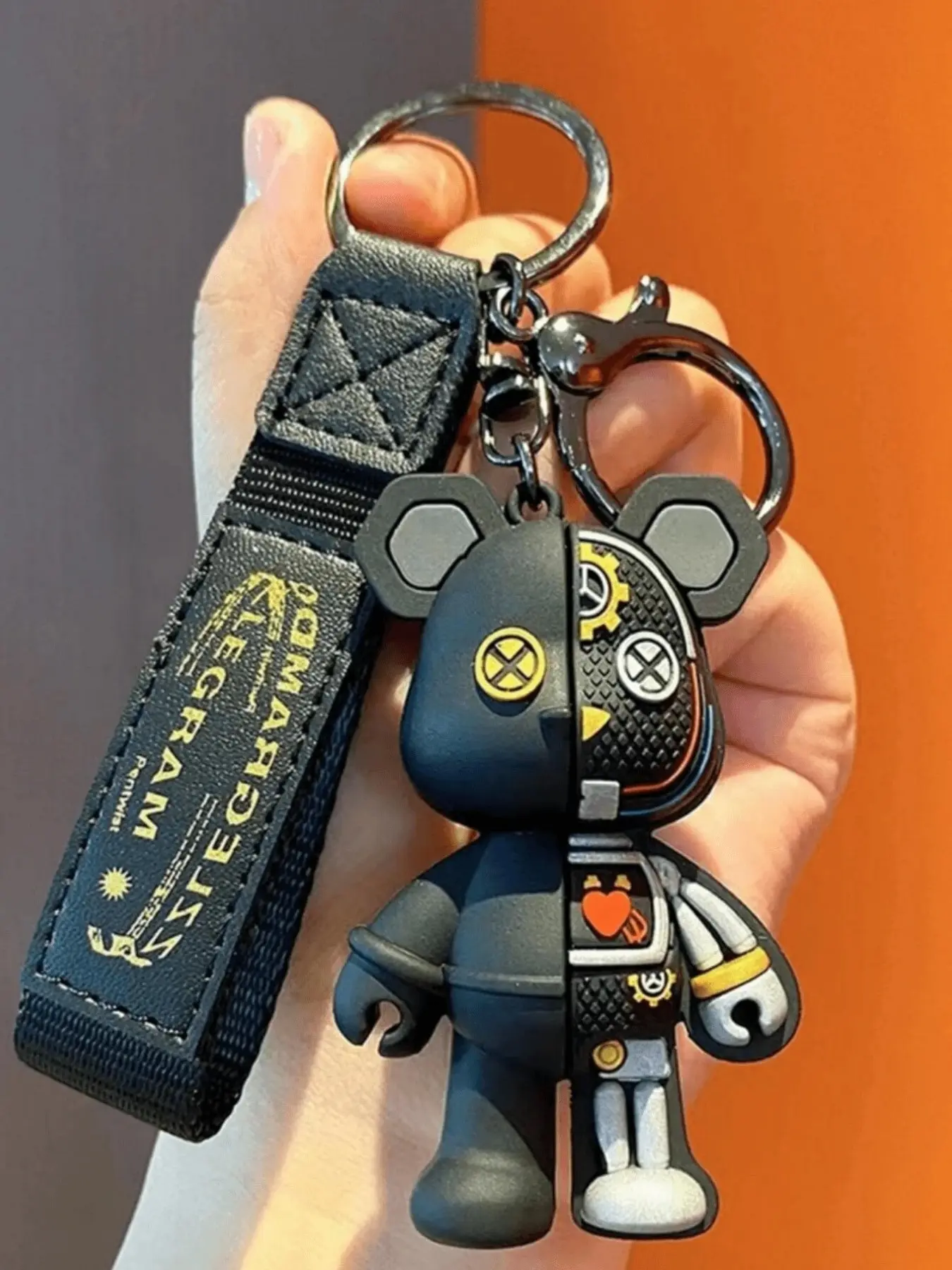 A mechanical bear pendant, keychain for bags, backpack pendant, unisex cartoon 3D figurine, fashionable and creative keychain, car bag decoration, holiday gift