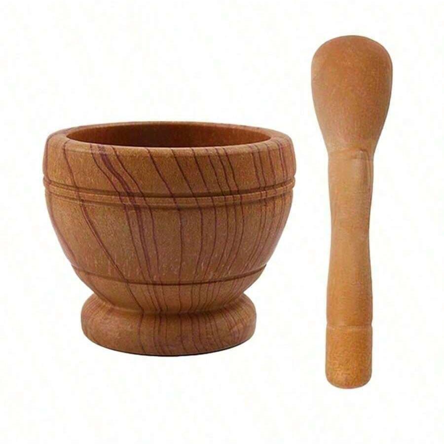 A practical garlic grinder with a mortar, a multi-functional manual food grinder, a kitchen crushing tool, a household garlic grinder, and a spice tool