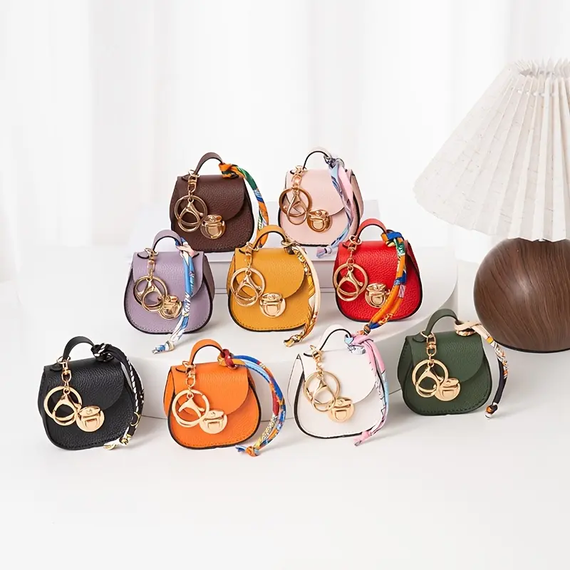 [Mini Saddle Pouch] Coin Purse Crafted from Litchi-Grain, This Mini Saddle Pouch Has Flip Cover, Metal Lock And Black Edge Binding. Detachable Colorful Scarf Strap for Bag Pendant Or Handheld. Compact to Store Earbuds, Lipstick, Coins And Access Cards