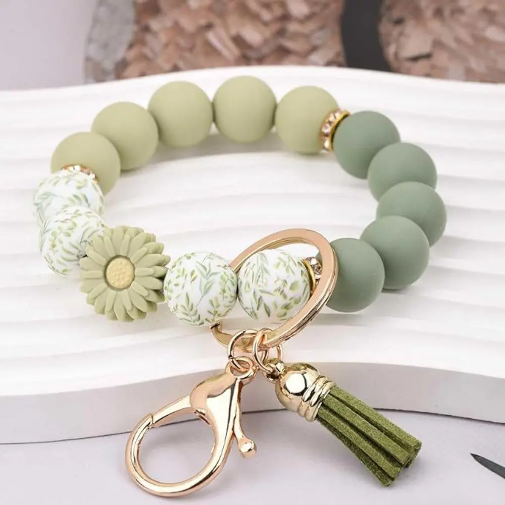 Women's Sage Green Silicone Beaded Wristlet Keychain - Cottagecore Aesthetic with Daisy Charm, Tassel Detail, Floral Print, Casual Everyday Pocket Keychain Charms & Twillies, Daily Wear