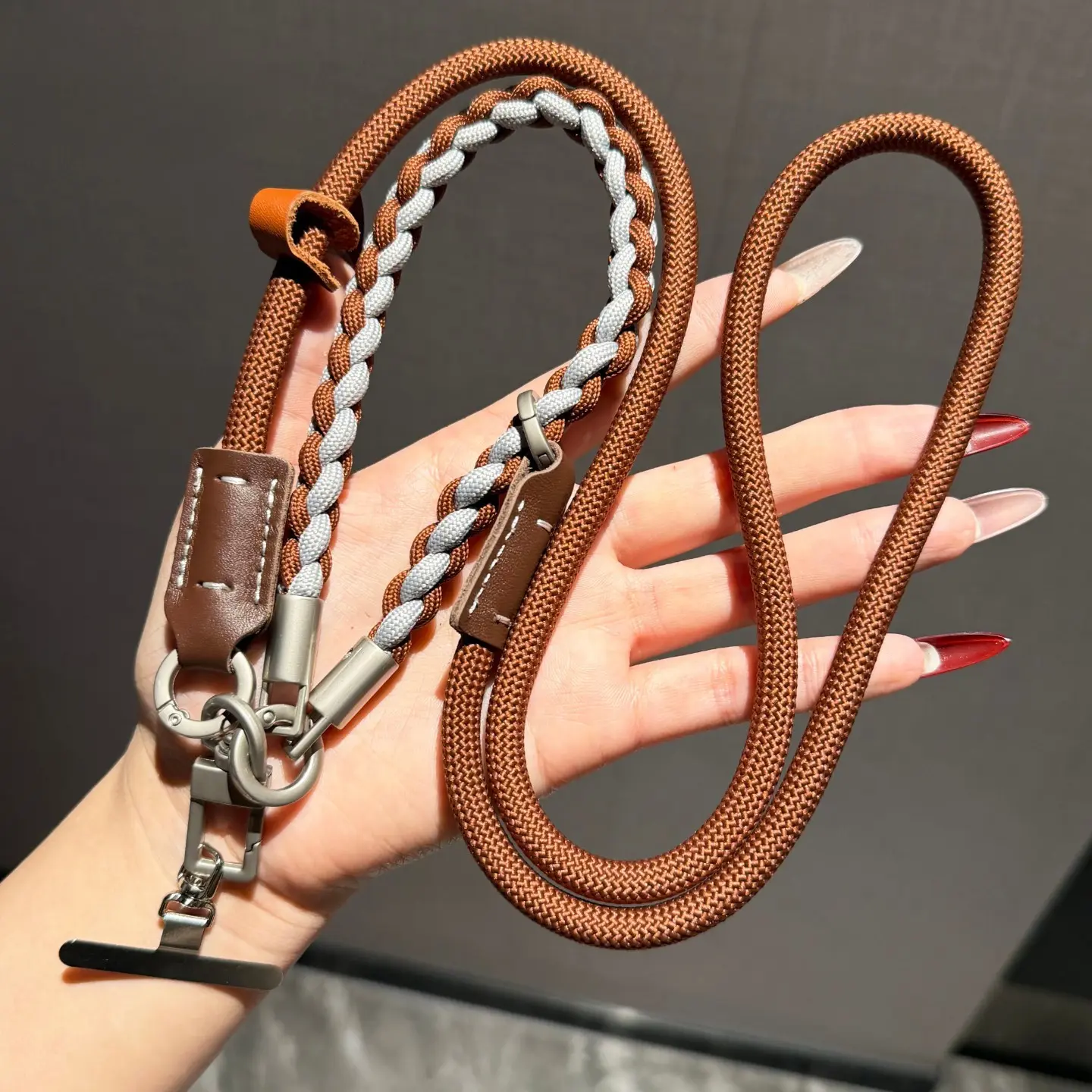 1 Pcs Braided Phone Lanyard - Adjustable Crossbody & Wrist Strap with Leather Detail & Metal Clasp, Anti-Lost Neck Strap with Phone Patch, Universal for All Phones, Casual & Outdoor Use.