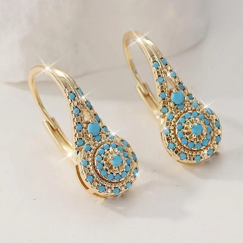 Women's Protective Gear: Vintage Ethnic Evil Eye Earrings in Gold-Plated Metal, Auspicious Turquoise Accessory with Secure Leverback Closure
