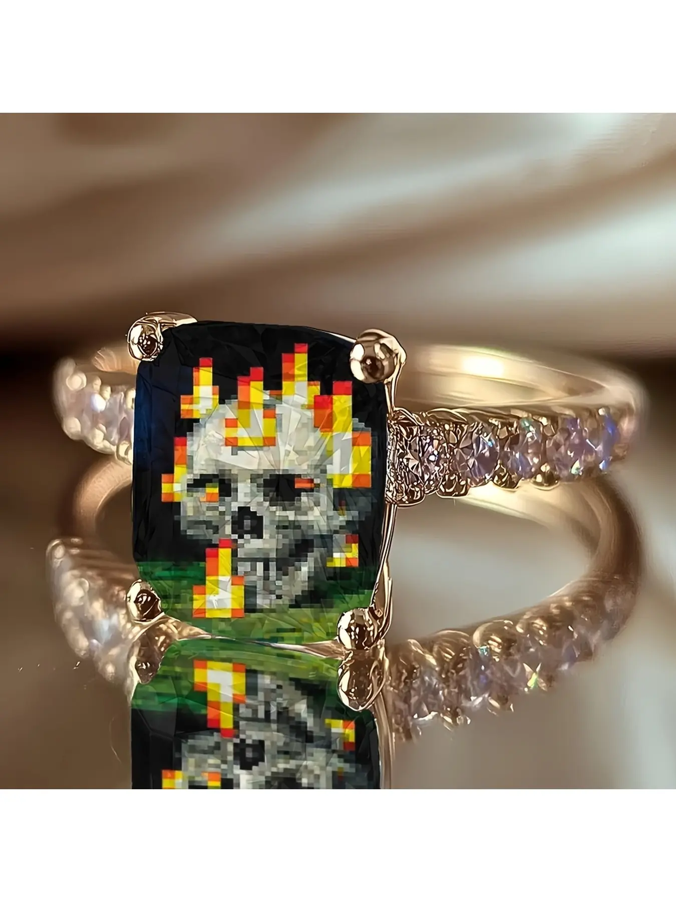 Pixel Flame Skeleton Print Ring, with a black faceted base color, featuring a retro pixel-style skull and red-yellow flame patterns. The main stone is fixed by four gold claws, and the ring band is set with a row of small diamonds.