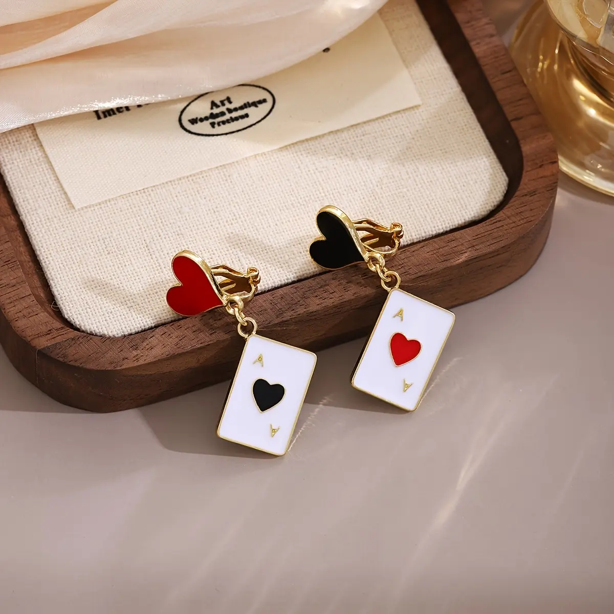 Fashionable and Creative Playing Card Earrings, Featuring an Asymmetrical Design with a Miniature Realistic of Spades Stud, a Unique Jewelry Piece for Women