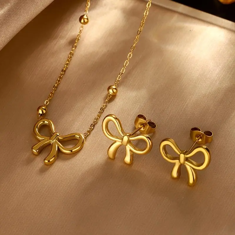 3Pcs Golden Titanium Steel Jewelry Set Elegant Women Bow Pendant Cute Hollow Ear Stud Luxurious Bow Earrings Golden Beads Adjustable Necklace Party Birthday Gift Wedding Engagement Anniversary Jewelry