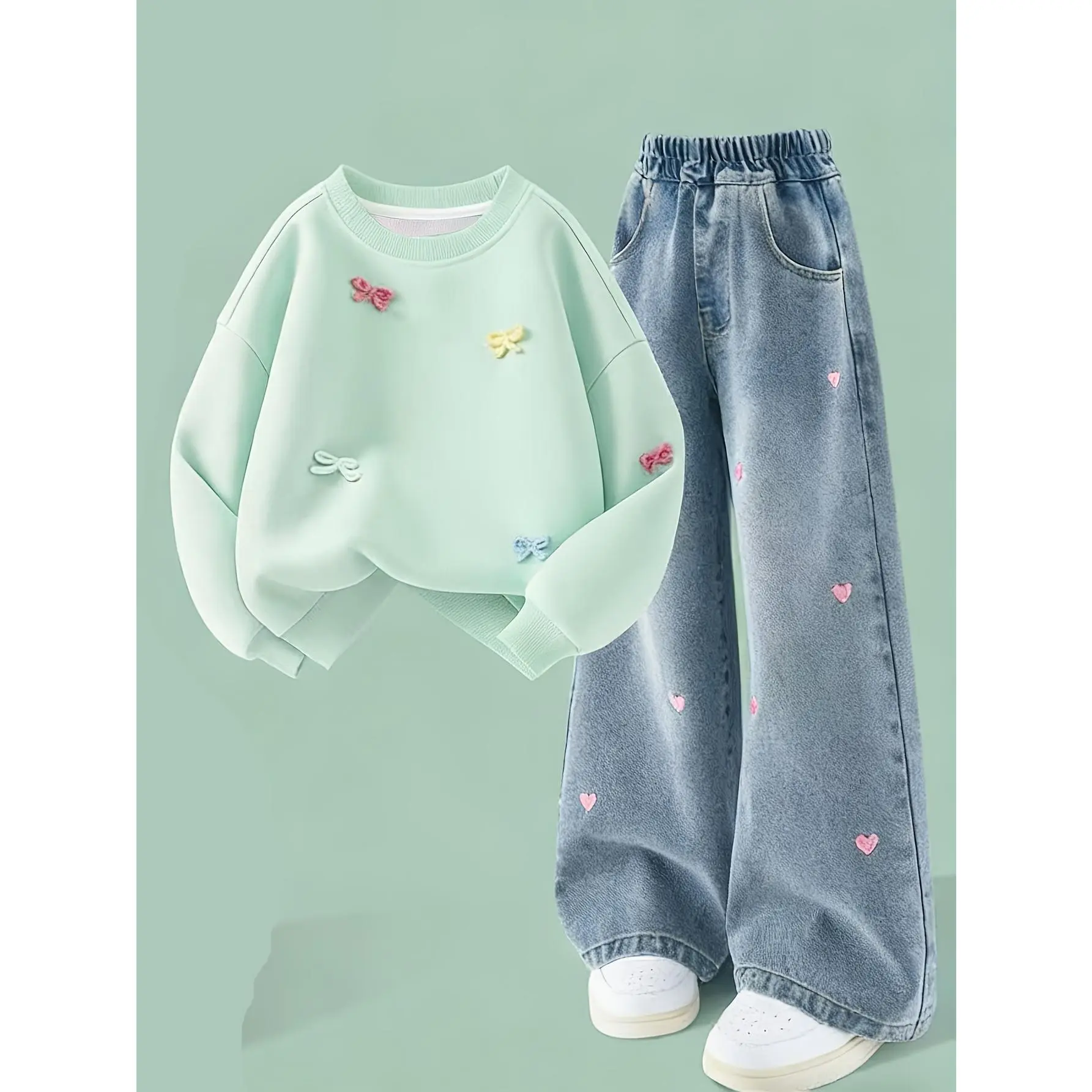 Three-dimensional Bow Embroidered Sweatshirt and Heart-Print Jeans Sweet Girl Set, Flattering on All Body Types, Relaxed Fit Set. Three-dimensional Bow Embroidered Sweatshirt and Heart-Print Jeans Girls' Spring/Autumn Set. New Children's 2pcs Set