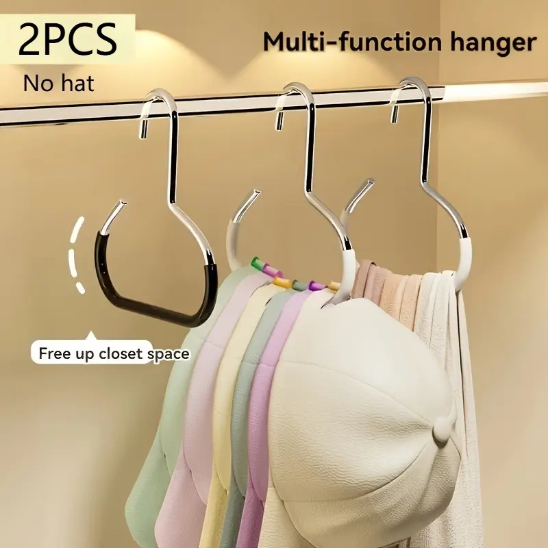 A multi-purpose anti slip hat rack with 2 anti slip suspension hooks, suitable for baseball closet hangers, hats, straps, ties, scarves, and underwear. Baseball caps hanging in the dormitory wardrobe