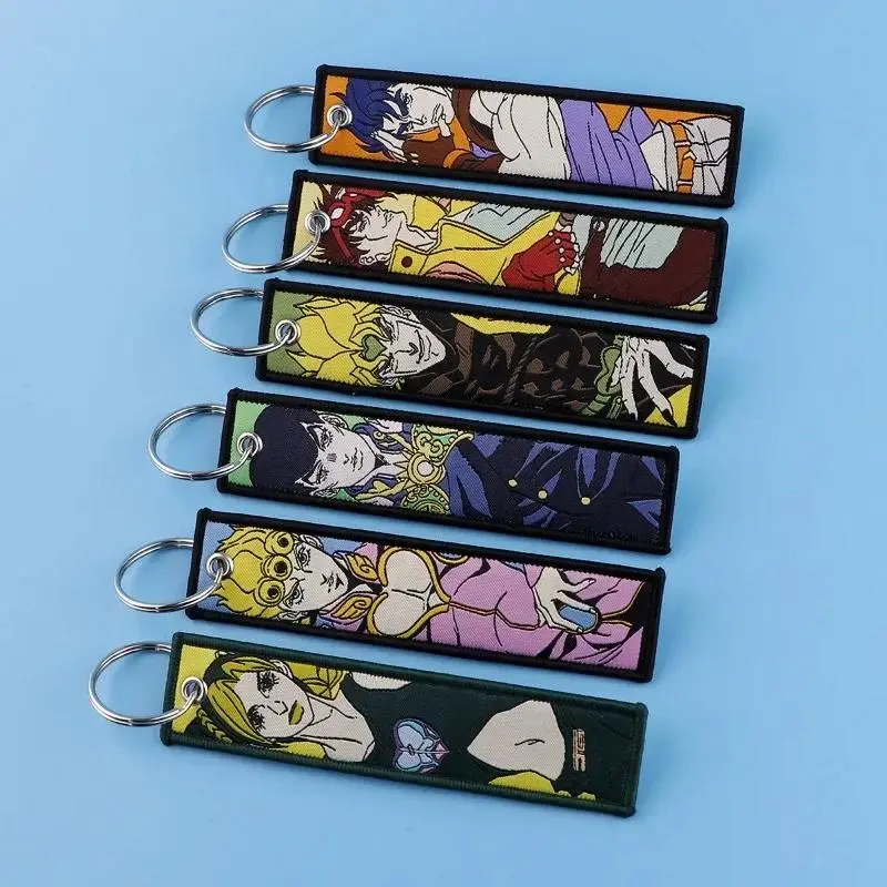 2PCS Weaving Mark Fabric Keychains for Anime Fans - Jojo's Bizarre Adventure, Berserk Themed Decorative Key Pendants (Toys & Hobbies, Novelty Gag Toys)