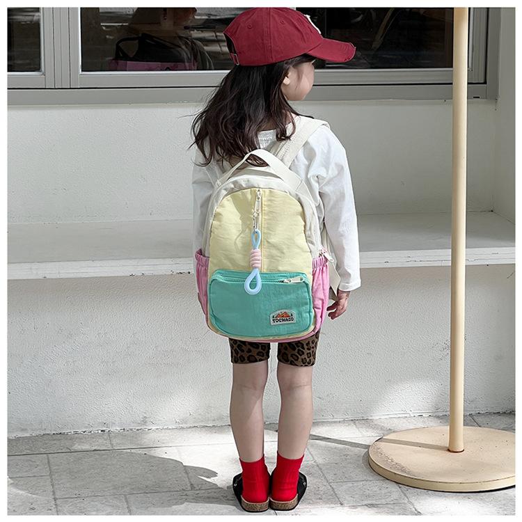 Boys' and girls' backpack 2026 new fashion color-blocking kindergarten baby school bag large capacity children's backpack