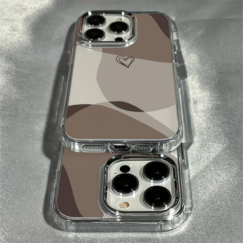 Phone case suitable for iPhone 17, 16 Pro Max, 15 Plus, 14, 13, 12 series. This trendy and creative luxury transparent brown heart-shaped phone case features an electroplated lens design