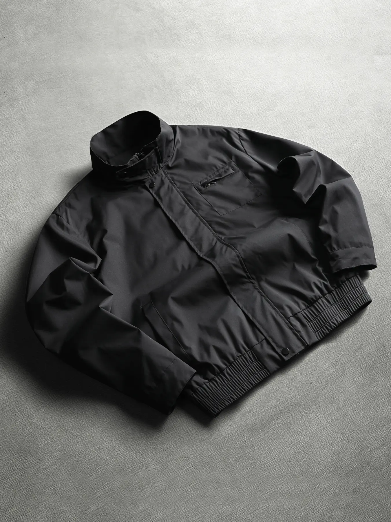 Black stand collar Harrington jacket, men's short workwear windbreaker, elastic hem casual jacket, solid color functional windbreaker, dark placket commuting jacket, assault style outdoor jacket, minimalist business jacket, zipper pocket baseball
