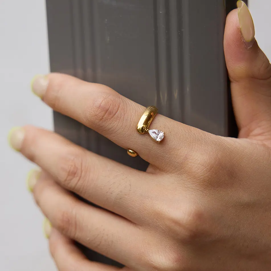 Main Character Energy Gold Pear Cut Statement Ring Polished Gold Tone with Clear Gemstone Effortless Glamour Baddie Vibes Delicate Everyday Luxury