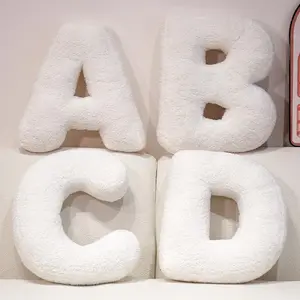 A complete set of 26 cartoon letter plush throw pillows in white, which can be customized with various colors. Perfect for creating festive decorations, letter-puzzle words for friends’ birthdays, and decorative items for various gatherings.