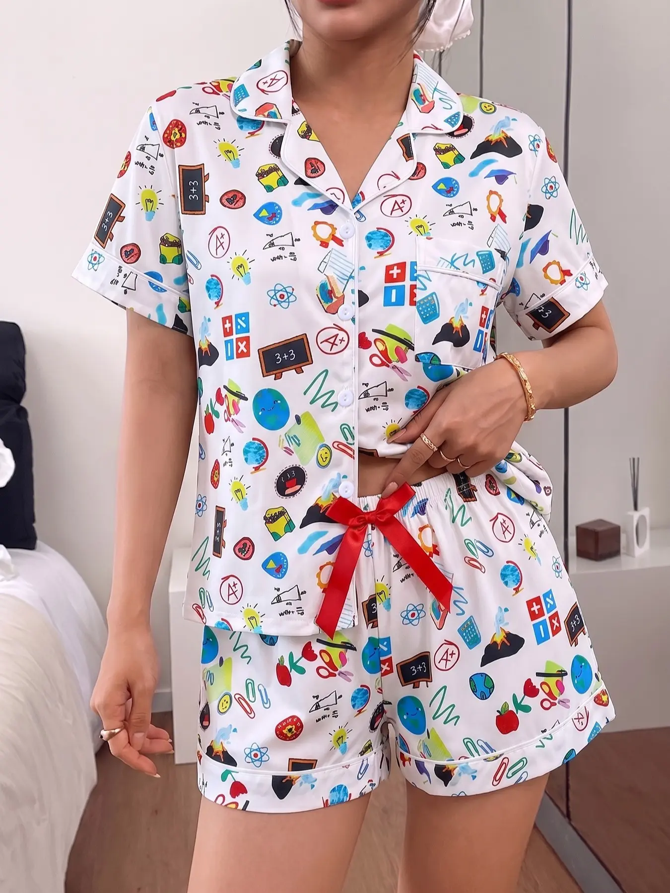 Women's 2-piece pajama set, Cartoon Pattern Pajamas, with white cartoon school prints, blackboards, college style. White piping lapel top with pocket, elastic shorts with red bow, soft all-season casual loungewear for women