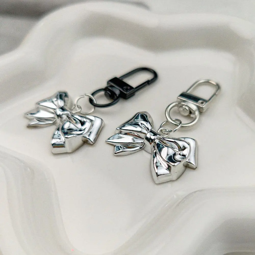 Glossy Mirror Silver Metal Bow Keychain, Minimalist Y2K Cool Tone Pendant With Spring Carabiner, Cute Bow Bag Charm For Handbags & Backpacks fly towards Silent Stress Relief Fidget mickey family