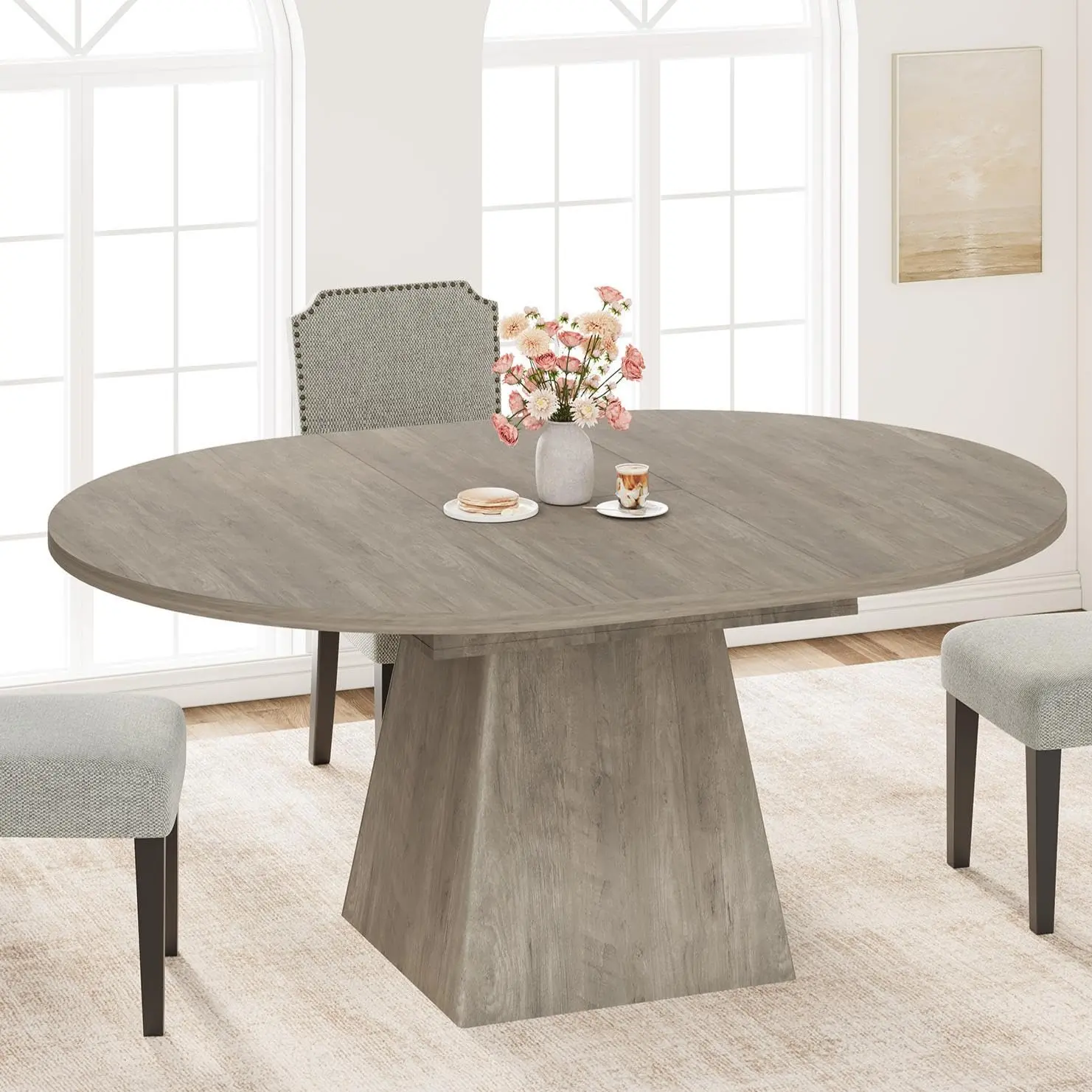 Extendable Round Shape Dining Table - Adjustable Size 47"-63", Accommodates 4-8 People, Stylish Grey Finish, Ideal for Versatile Dining Spaces