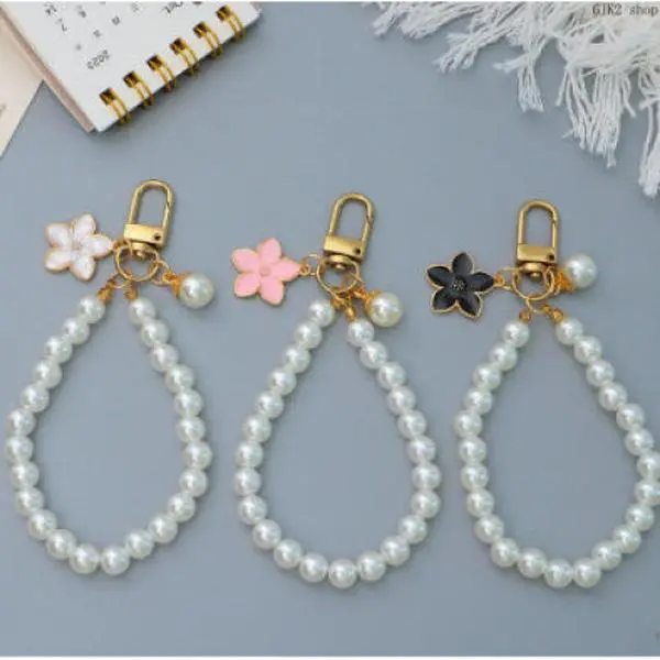 Women's Faux Pearl Wristlet Keychain - Elegant Cherry Blossom Enamel Charm, Beaded Wrist Strap Flower Pendant, Gift Item for Keys & AirPods, Enamel Pearl Feminine Charm Beaded Chain Accessory