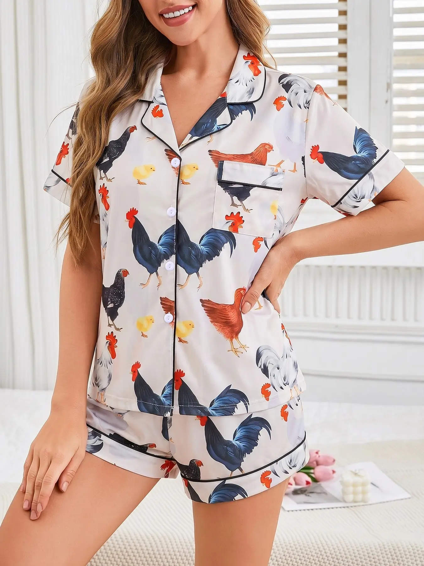 Women's 2-piece pajama set with fun realistic farm rooster, hen and chick prints on cream base, black contrast piping. Lapel short sleeve top with small pocket, soft elastic waist shorts, comfy casual loungewear for women all-season daily wear