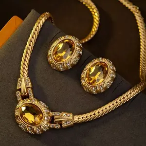 Pre-owned jewelry set featuring vintage European/American earrings and a necklace—ear studs with intricate craftsmanship and inlaid stones, light luxury aesthetic