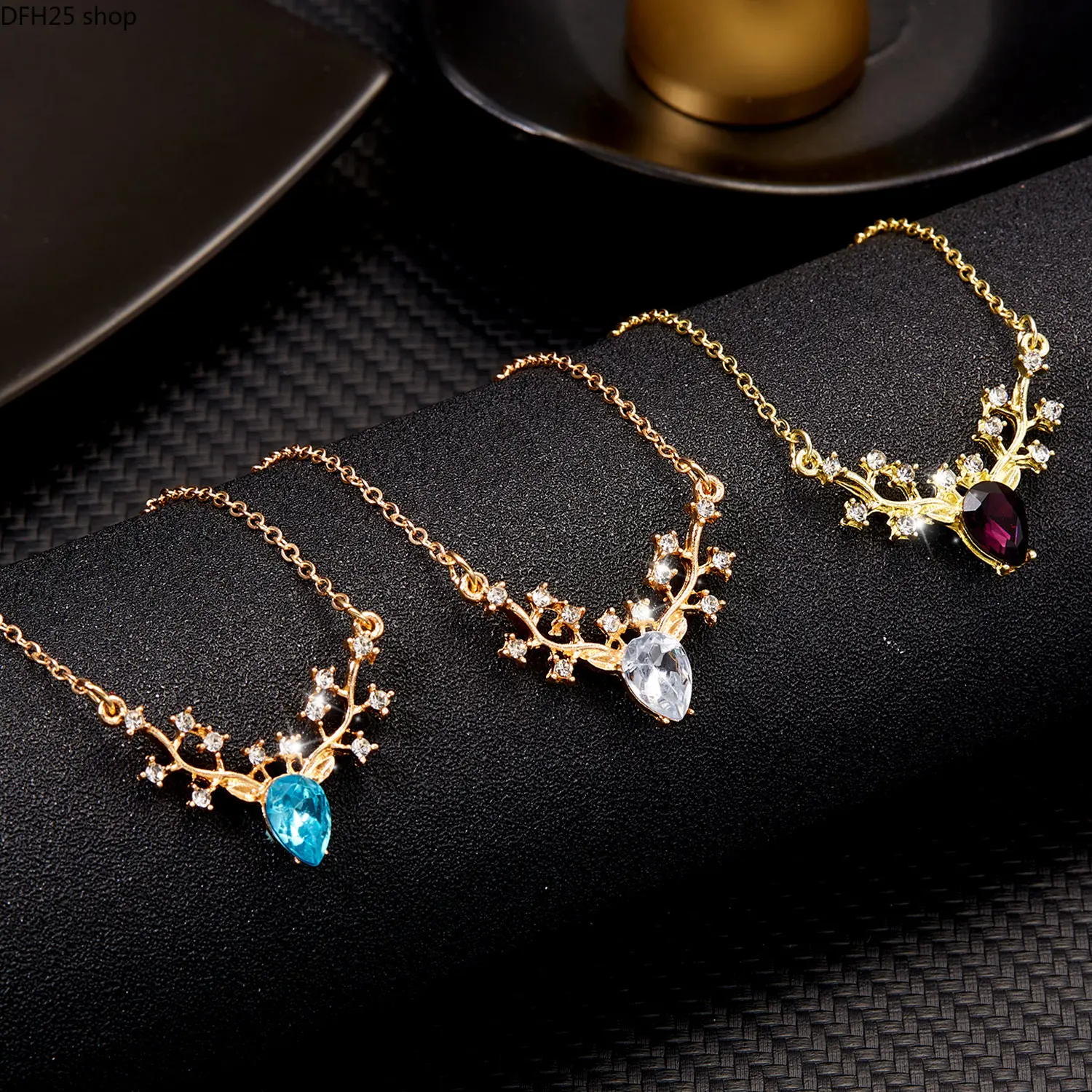Reindeer Crystal Pendant Necklace for Women, Gold Tone Antler Charm with Teardrop Stone, Elegant Christmas Jewelry for Holiday Parties and Winter Outfits