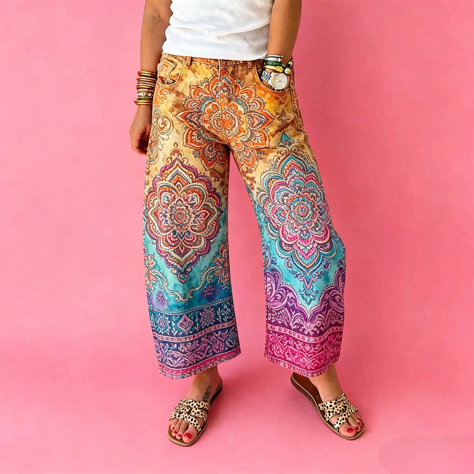 Women's vintage-wash wide-leg jeans; Y2K-style loose-fitting trousers; soft pink base with a bohemian floral print; suitable for year-round outdoor activities and streetwear styling.