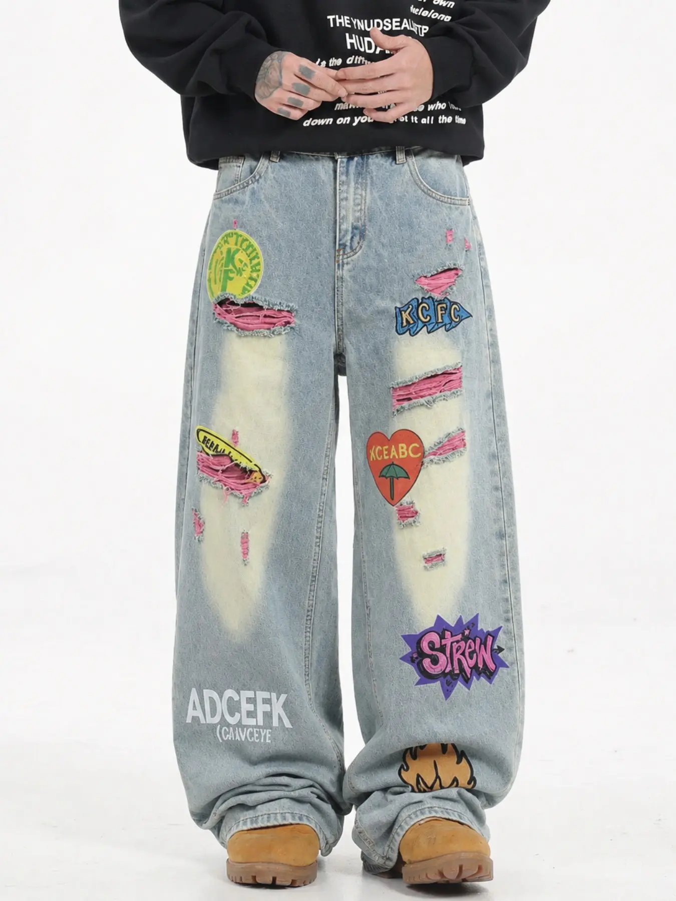 Men’s Light Blue Washed Baggy Jeans with Colorful Graphic Patches and Pink Distressed Rips, Wide Leg Y2K Streetwear Denim Pants