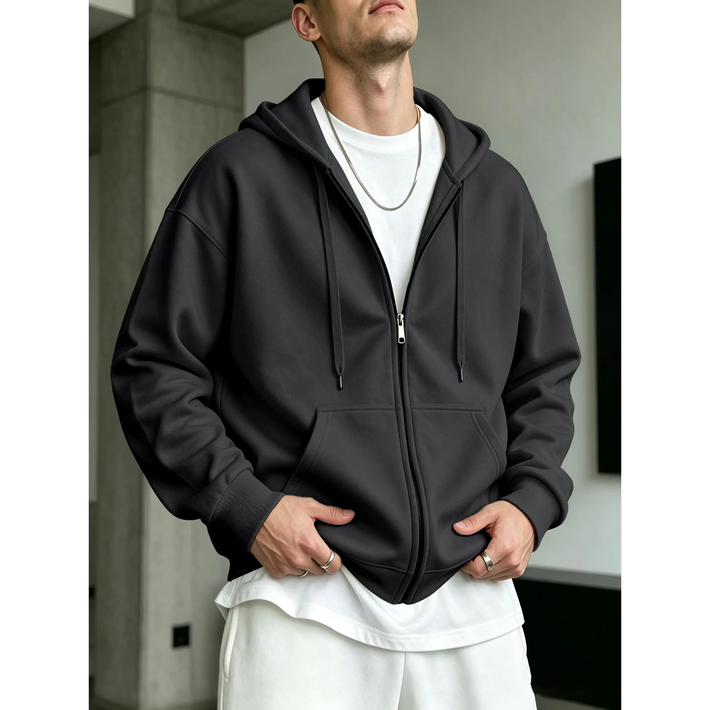 Classic open front zip hoodie made of breathable cotton material, featuring ribbed cuffs and hem, relaxed silhouette for comfortable wearing, simple understated design as a staple piece for everyday mensfashion styling.