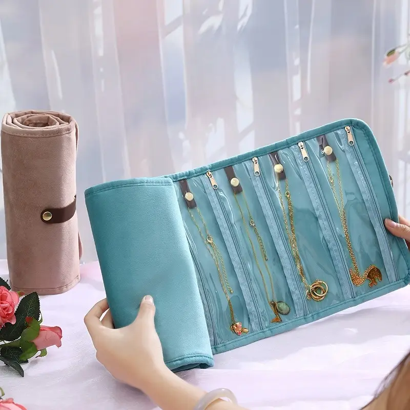 Compact jewelry storage roll, foldable organizer bag with ample space, suitable for rings, earrings, necklaces, and bracelets - a stylish gift for travel and jewelry storage