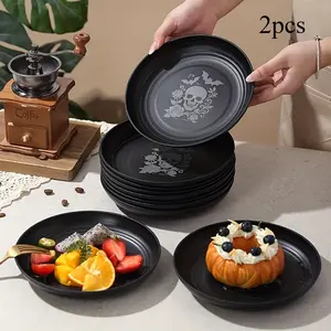 Two-piece plastic dinner plate set with skull and rose design. Perfect for family use, can be used as dinner plates, fruit plates, snack plates, dessert plates, and salad plates. Ideal for Halloween, Day of the Dead, Christmas, and Thanksgiving.