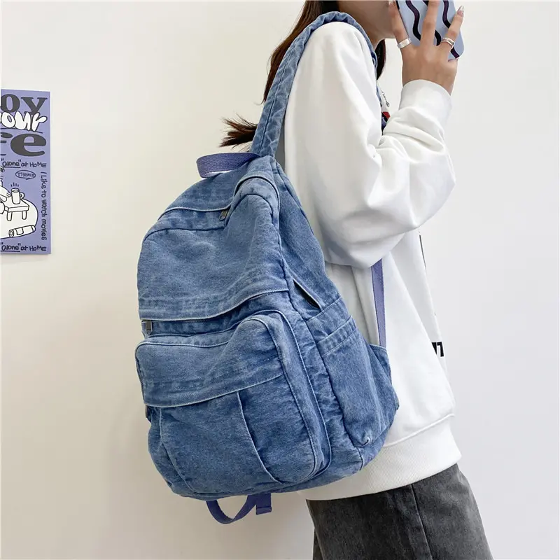 Unisex Y2K-style denim backpack—casual, lightweight, and classic retro; a versatile, high-capacity, solid-color backpack