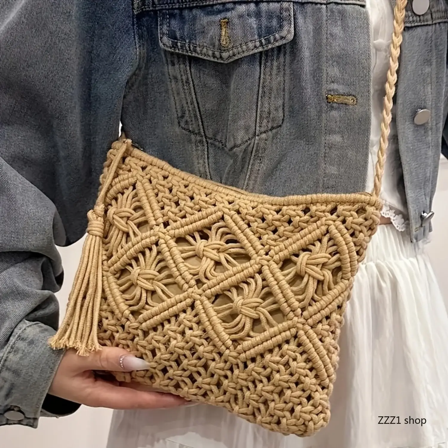 Bohemian-style handmade woven shoulder bag for women – summer beach tote with zipper closure, polyester lining, geometric pattern, and tassel details; khaki/white.