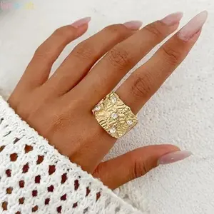 Trendy unisex nugget ring coated in premium 14K gold plating. Bold chunky hip hop statement jewelry with solid durable construction for everyday wear. An amazing gift choice for birthdays and all streetwear fashion lovers.