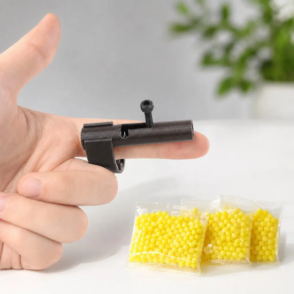 Mini Finger Gun with 150 Ammo, Petg Prank Ring Launcher, Desk Toy, Stress Relief, Low Range, Kids' Fun, Creative Prank Item