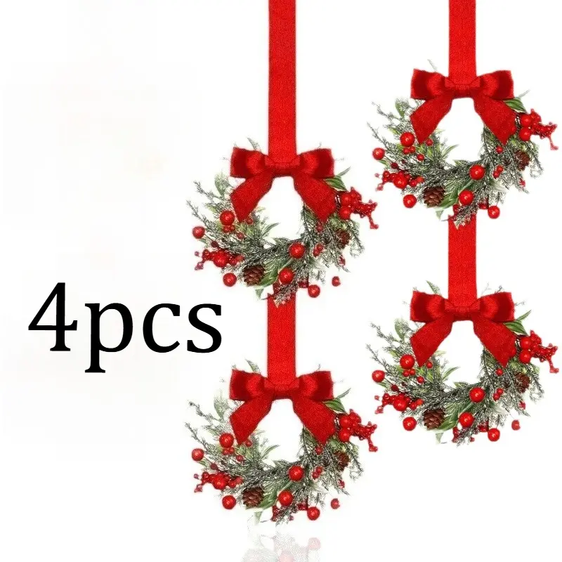 Four mini Christmas wreath ornaments, Flower Wreath with Pine Cone, featuring a red velvet bow and faux frosted pine branches, berries, and small flowers, can be hung on front doors, cabinets, and windows for Christmas holiday decorations.