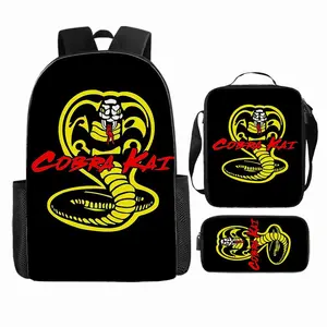 Cobra Gymnasium bright yellow snake logo three-in-one backpack with pure black base, fabric double-shoulder bag paired with insulated lunch bag and large-capacity pencil case, suitable for daily study and leisure travel