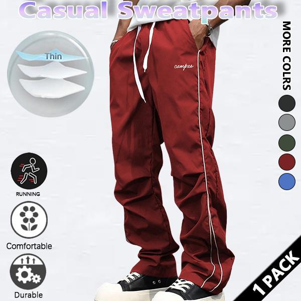 Loose-fitting sweatpants for men, grey side stripes with gold accent stripes, comfortable design, sports casual style bottoms, sweatpants, fitness wear, today's fashion outfit