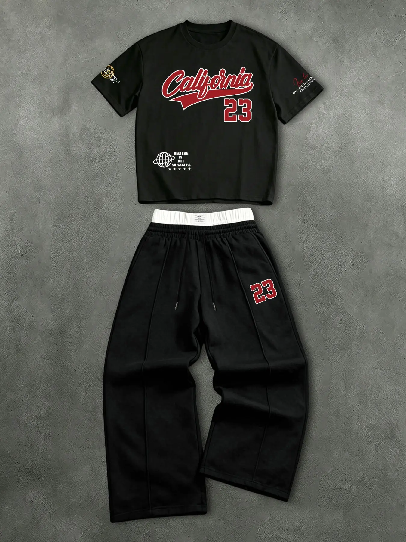 This men's short-sleeved T-shirt Matching set includes a T-shirt with a graphic of letters and numbers and a pair of double-waisted sweatpants, making it a casual, stylish, comfortable, and breathable two-piece summer outfit for men.