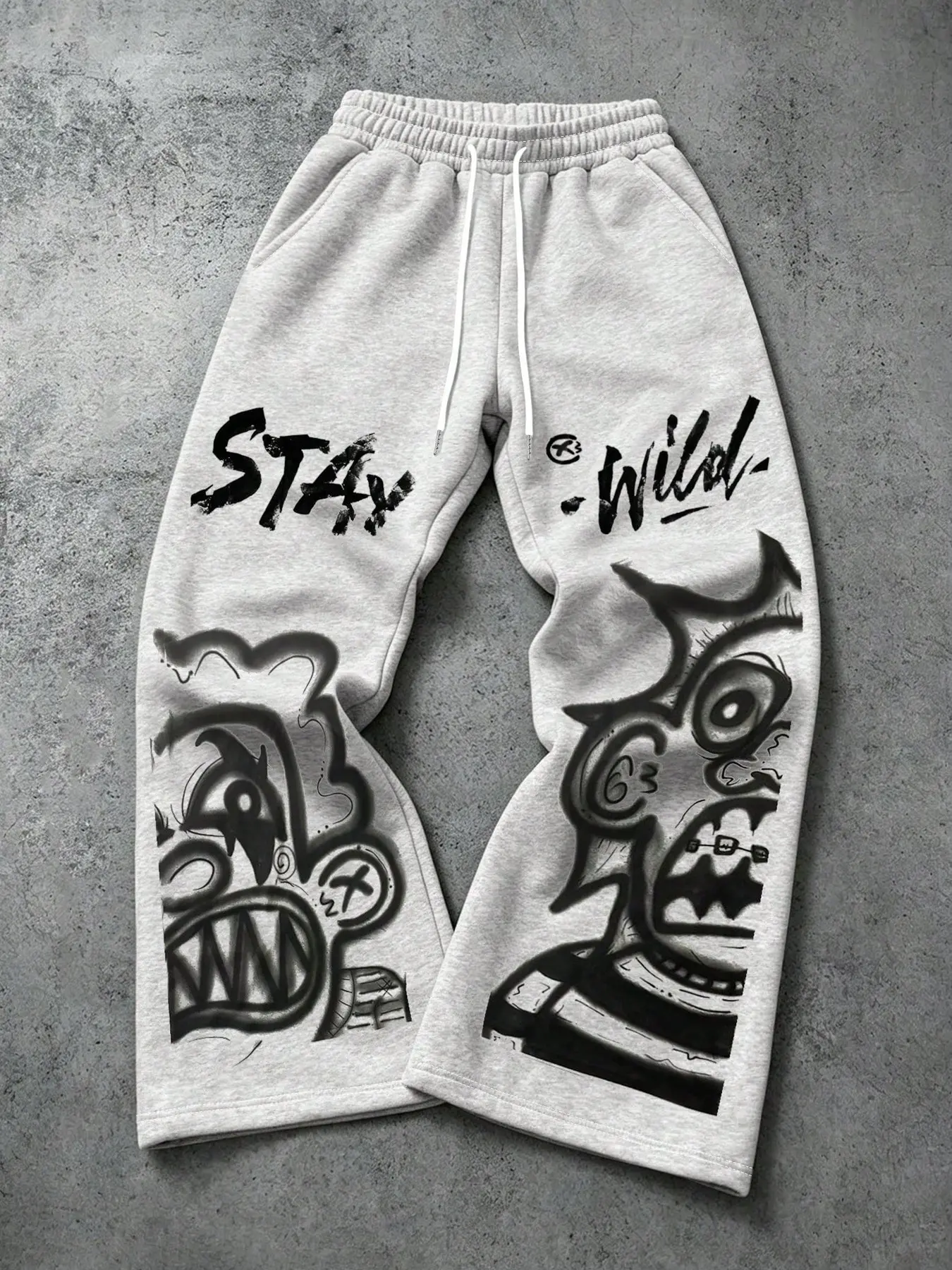 Vintage Underground Graffiti Cartoon Monster Graphic Wide Leg Sweat Pants, Jogging Pants Men Oversized Baggy Heather Grey Joggers Brush Font Print Stretch Rib Drawstring Waist Soft Fleece Relaxed Streetwear Trousers Trendy Urban Skate All Season Casual