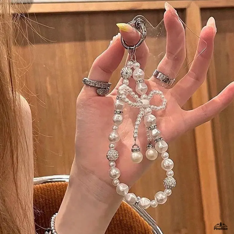 Irregular White Pearl Bow Rhinestone Mobile Phone Lanyard - Luxury Trend Accessory, Sparkly Anti-Fall Strap, Solid Wear-Resistant Bag Charm for Outdoor Commute, Shopping