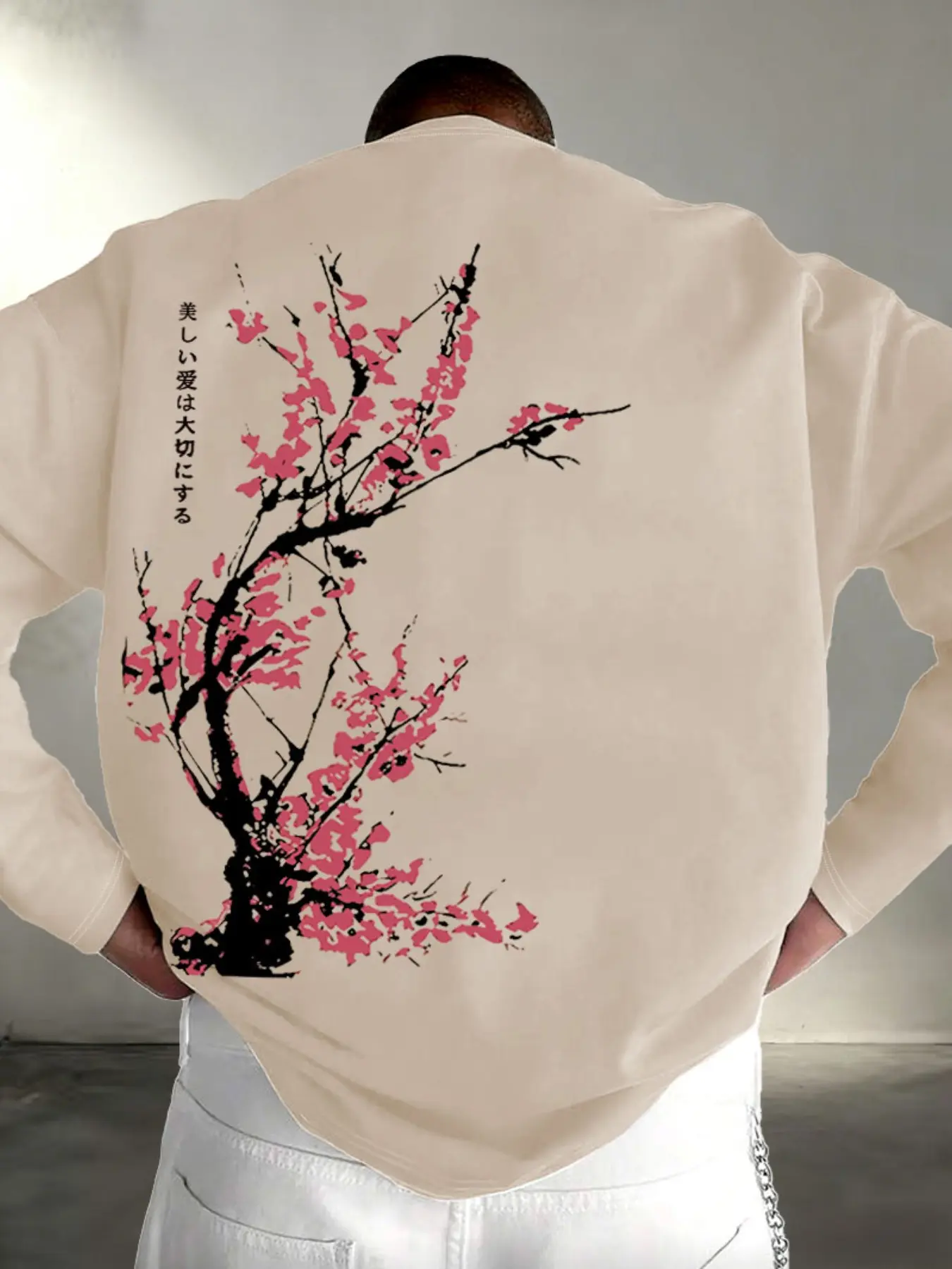 Oversized crew neck long sleeve tee with ink wash plum blossom and Japanese text print, soft breathable casual top with traditional Japanese aesthetic, ideal for daily wear, street shooting and everyday casual matching#PlumBlossomShirt #JapaneseAesthetic
