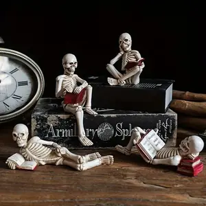 A set of 4 Halloween-themed resin figurines featuring skulls and a person reading a book. Creative home decoration items for bookshelves, suitable for Halloween decoration.